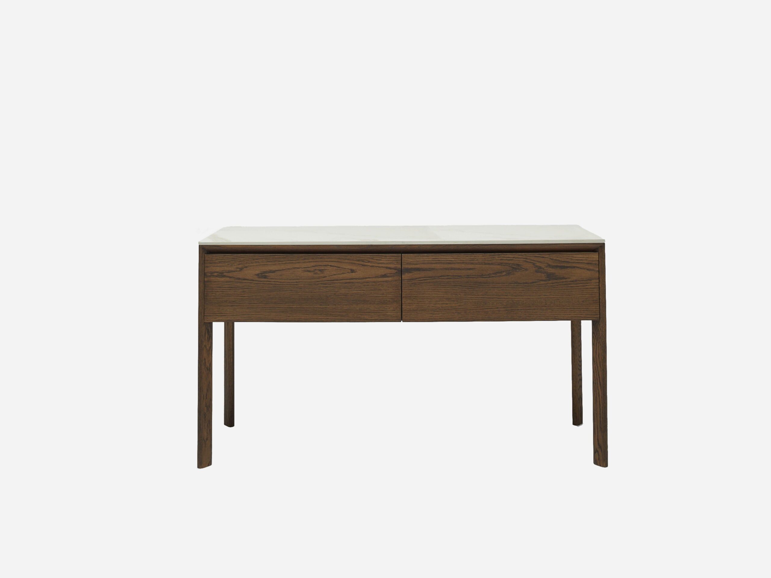 A modern wooden desk with four legs, two drawers, and a smooth, light-colored top, set against a plain white background.