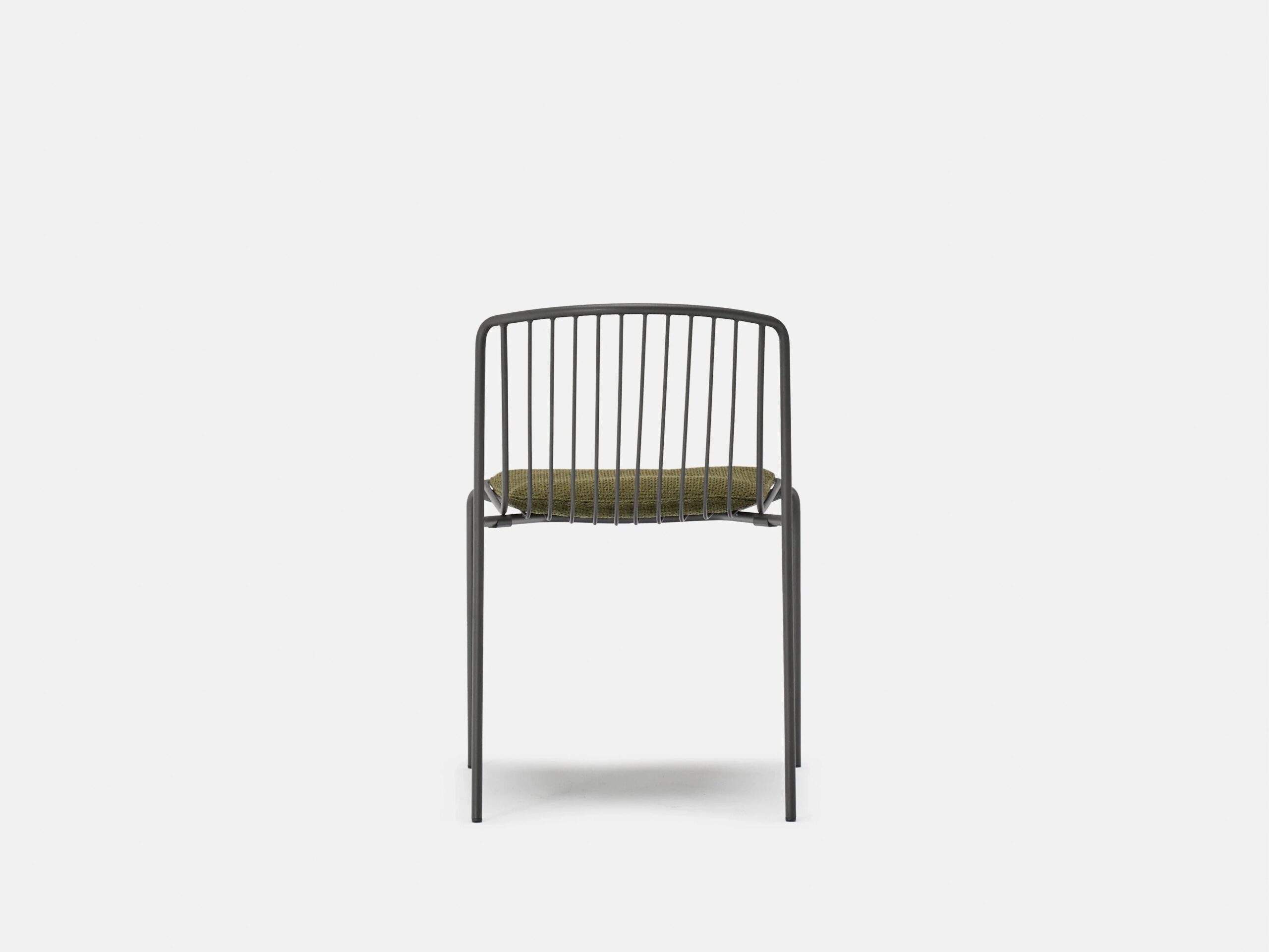 A minimalist chair with a black metal frame, vertical slats on the backrest, and a green cushioned seat, shown against a plain white background.