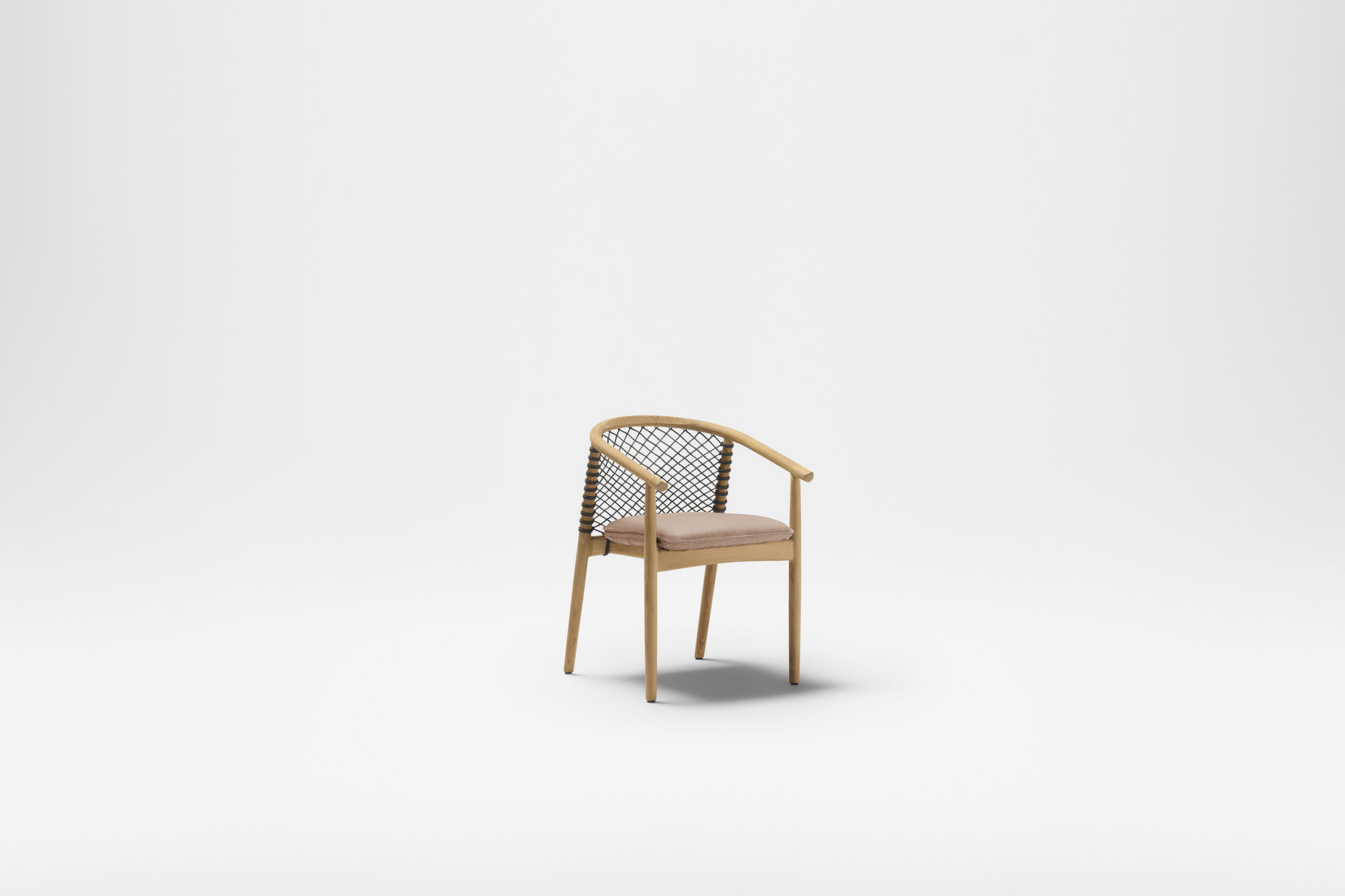 A modern chair with a light wooden frame and angled legs. The backrest has a lattice design made of dark material, and the seat cushion is upholstered in a light beige fabric. The chair is photographed against a plain white background.